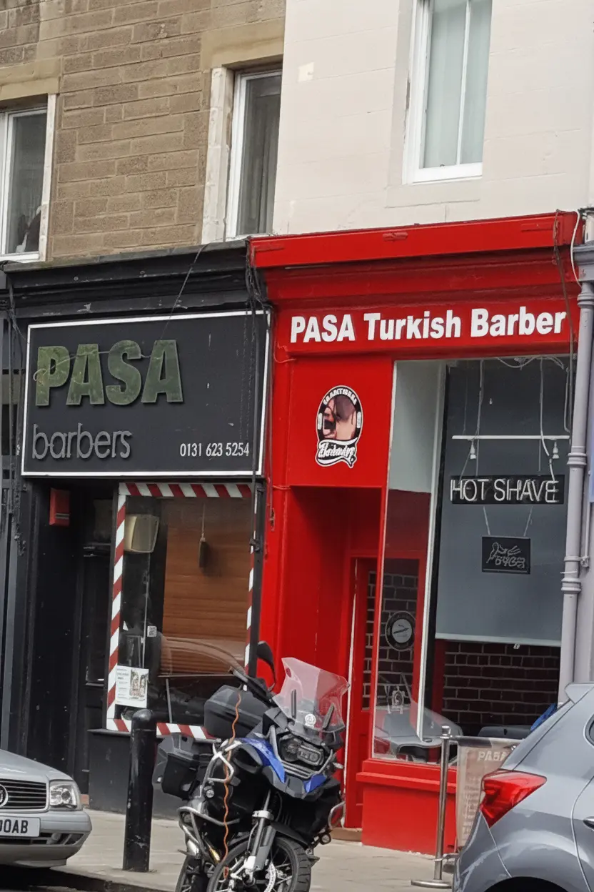 PASA Turkish Barber shopfront on Raeburn Place, Edinburgh — red fascia sign, badge roundel and Hot Shave neon above the doorway
